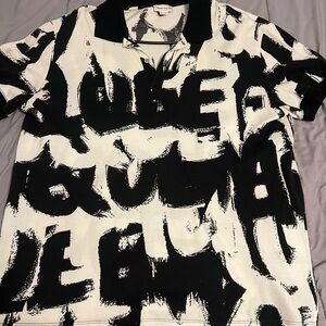 White & black Mcqueen graffiti polo